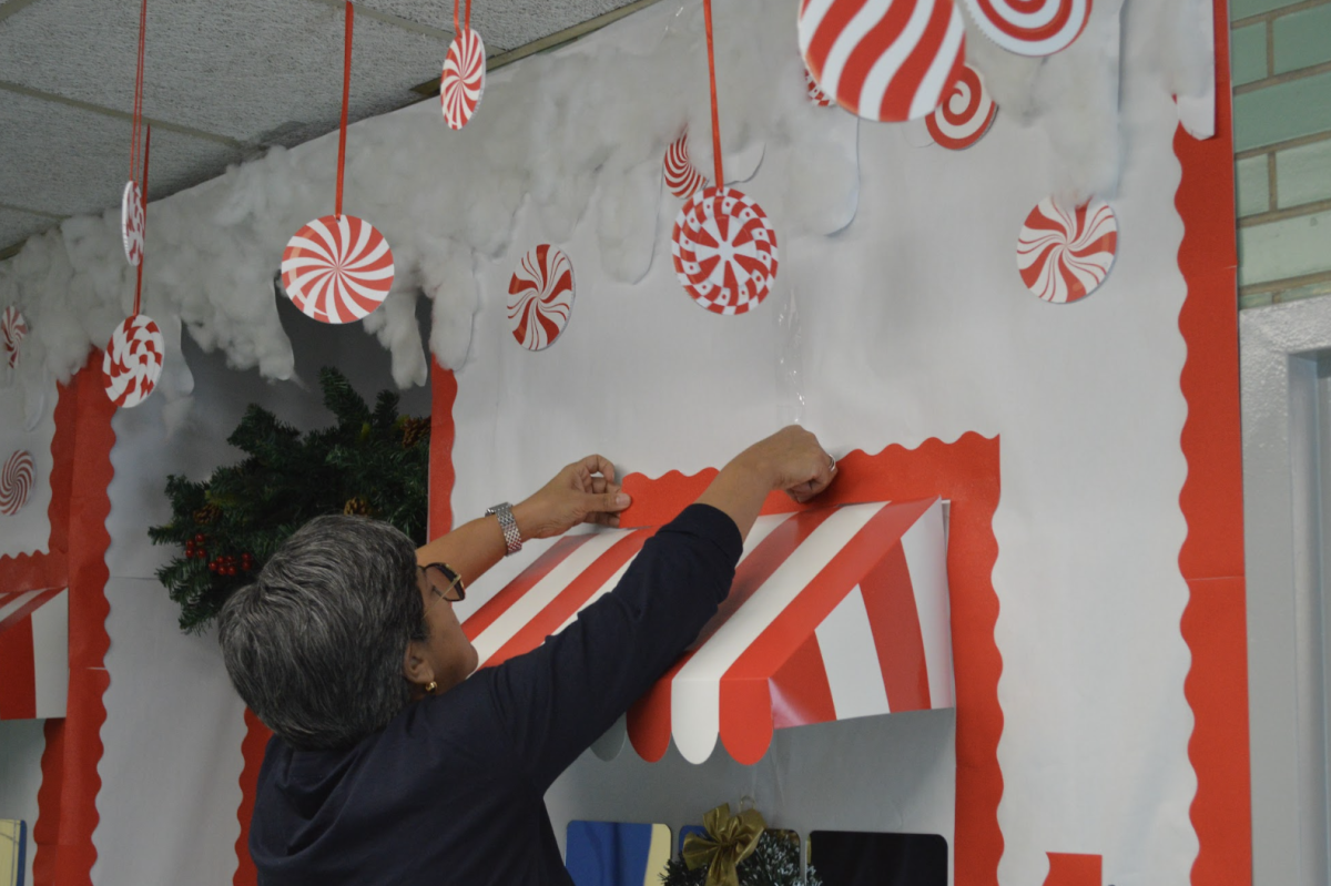 Mrs. Pincay decorates the world languages department hallway to help promote festive spirit throughout the school.